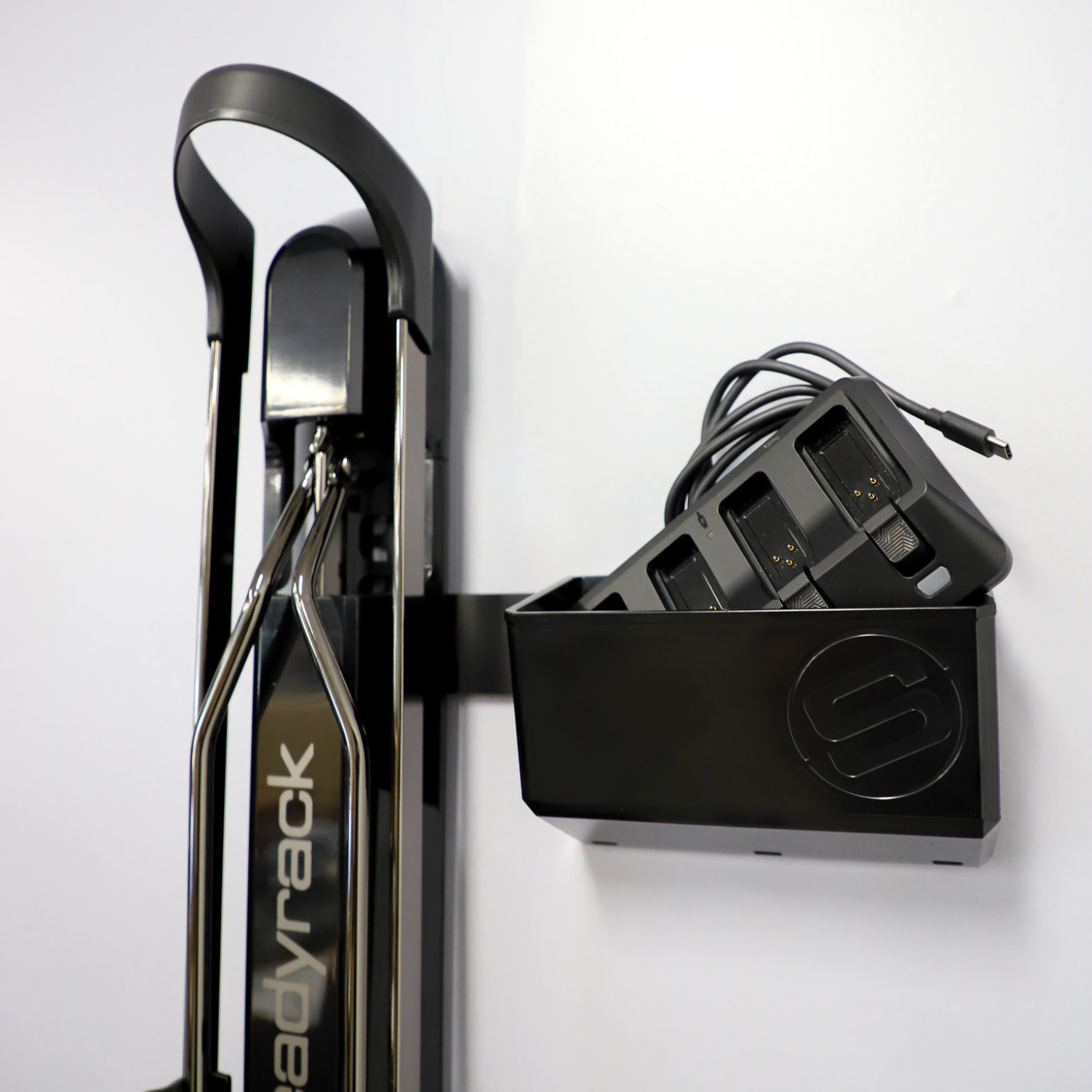 The GearMate Small Steady Bin storing an electric bike charger. 